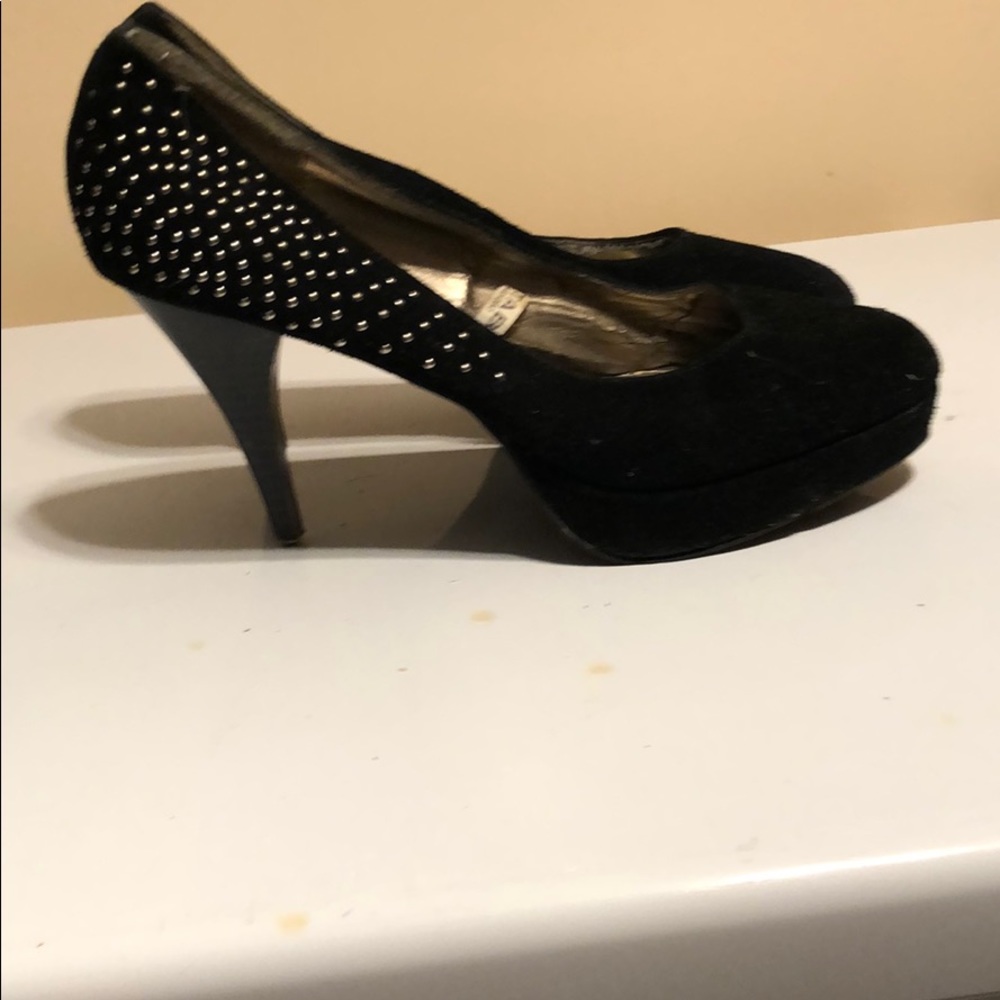 Black swayed heels
